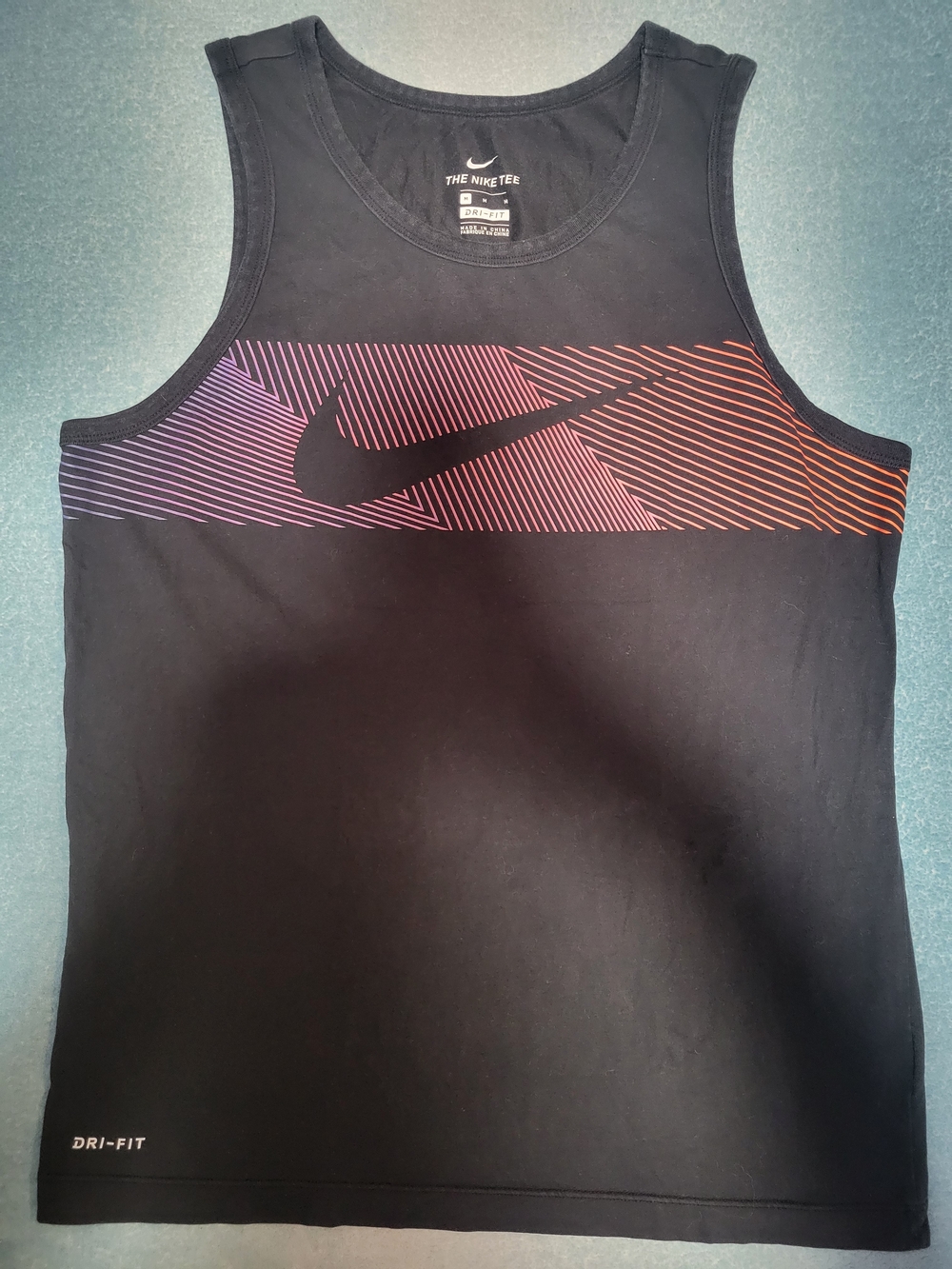 Nike Men’s Black Tank Top with Purple-to-Orange Stripe Graphic